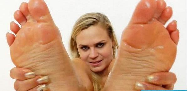  Stirring feetjob by a blonde